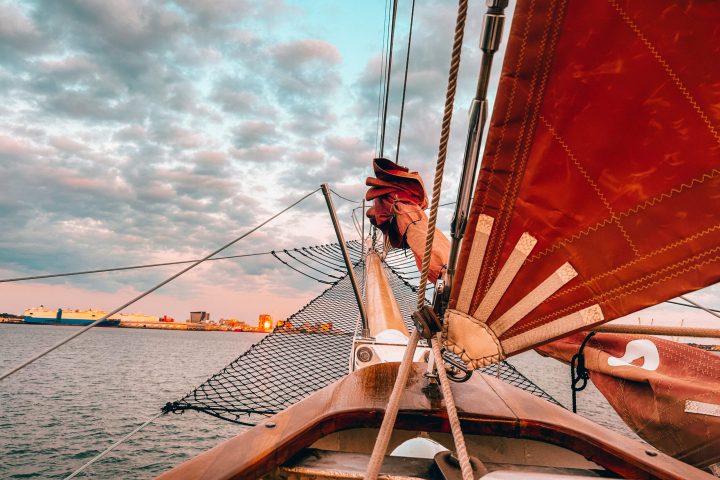 a wooden boat in a body of water